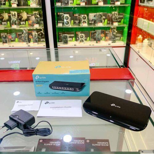 ảnh chụp Switch TP-Link TL-SG1008D cùng phụ kiện đi kèm