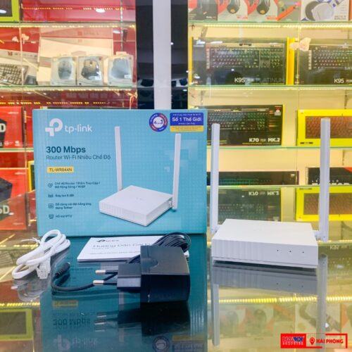 ảnh chụp Bộ phát wifi TP-Link TL-WR844N Wireless N300Mbps cùng phụ kiện đi kèm